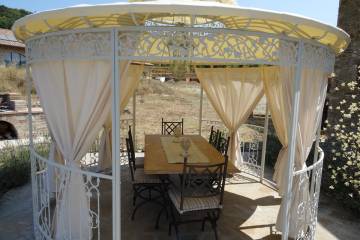 Copertura e tendaggi per gazebo circolare