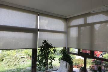 Tenda a rullo motorizzata con fascia decorativa